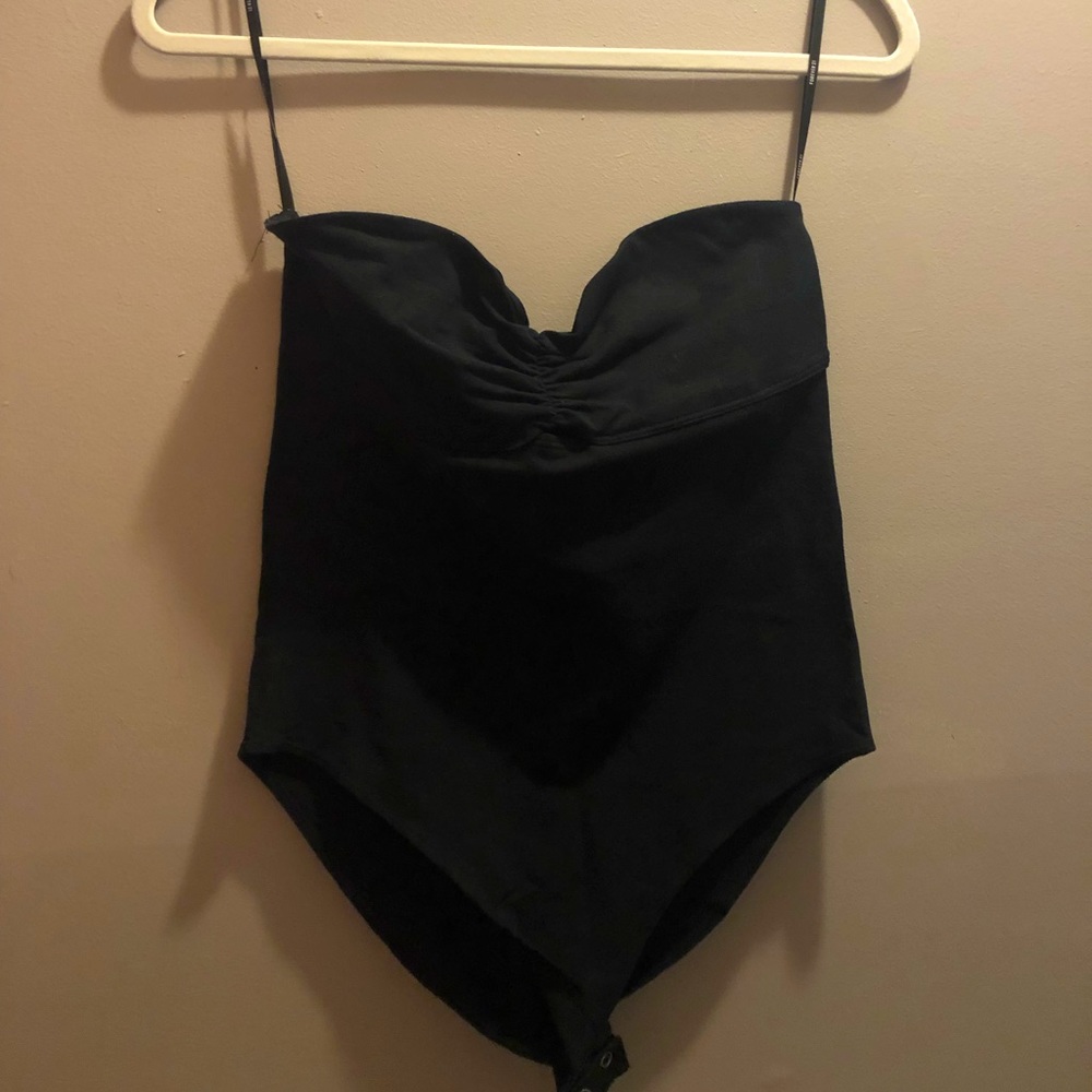 Strapless body suit w/ small peekaboo hole in the chest size medium